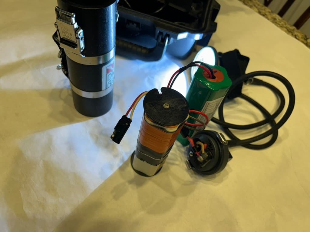 2 Dive Rite canister lights, 1 LX25 and 1 H-10, 3 batteries.   Used, selling as  3