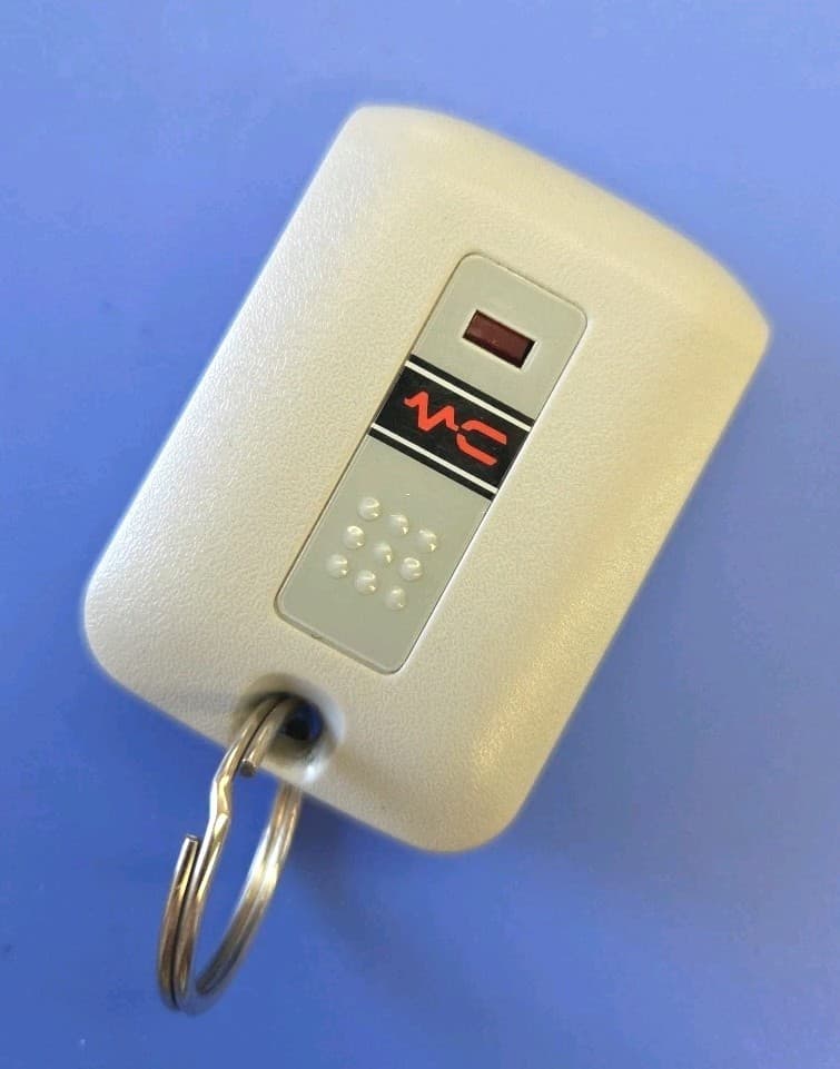 USED Linear EF4 Micro-10 Multicode Keyring Transmitter