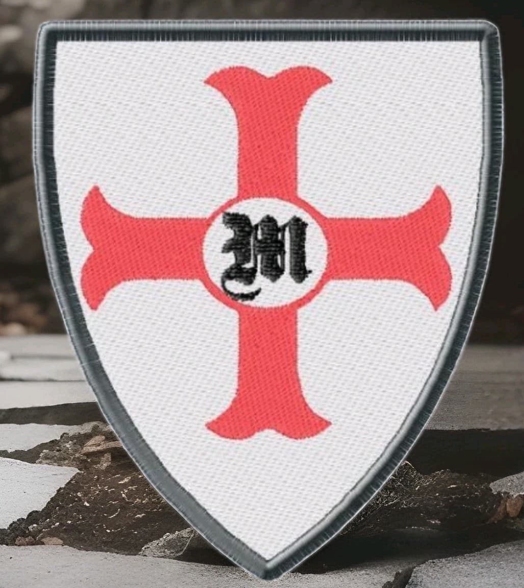 Patch with the symbols of the Order of Montreal.