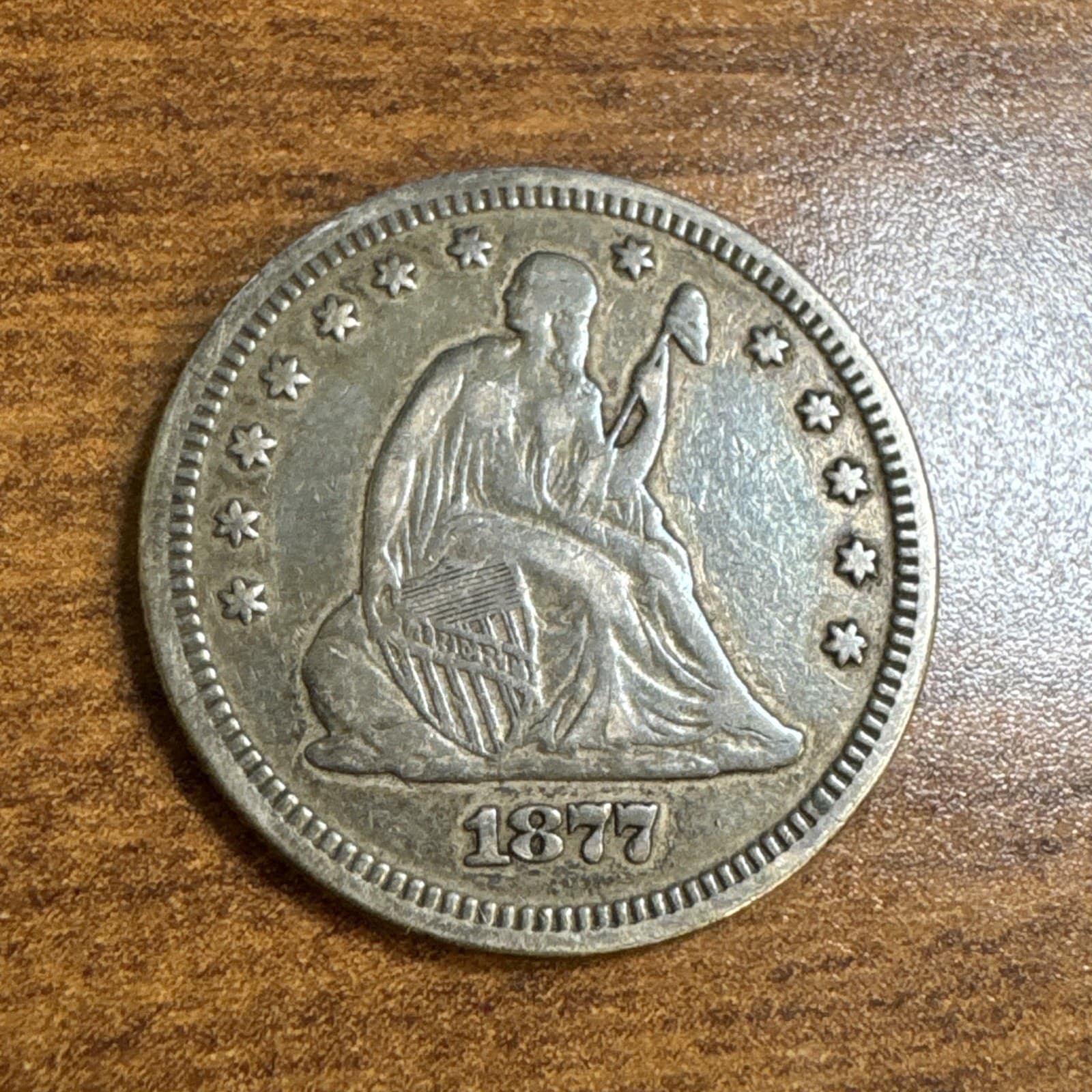 1877 Liberty Seated Silver Quarter VF+