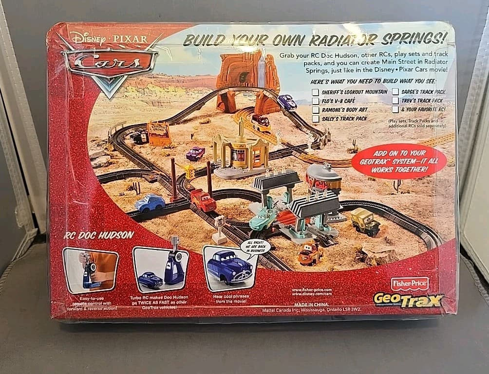 NEW Sealed 2009 Fisher Price Disney Pixar Cars GeoTrax RC Doc Hudson 2-7 Turbo 2