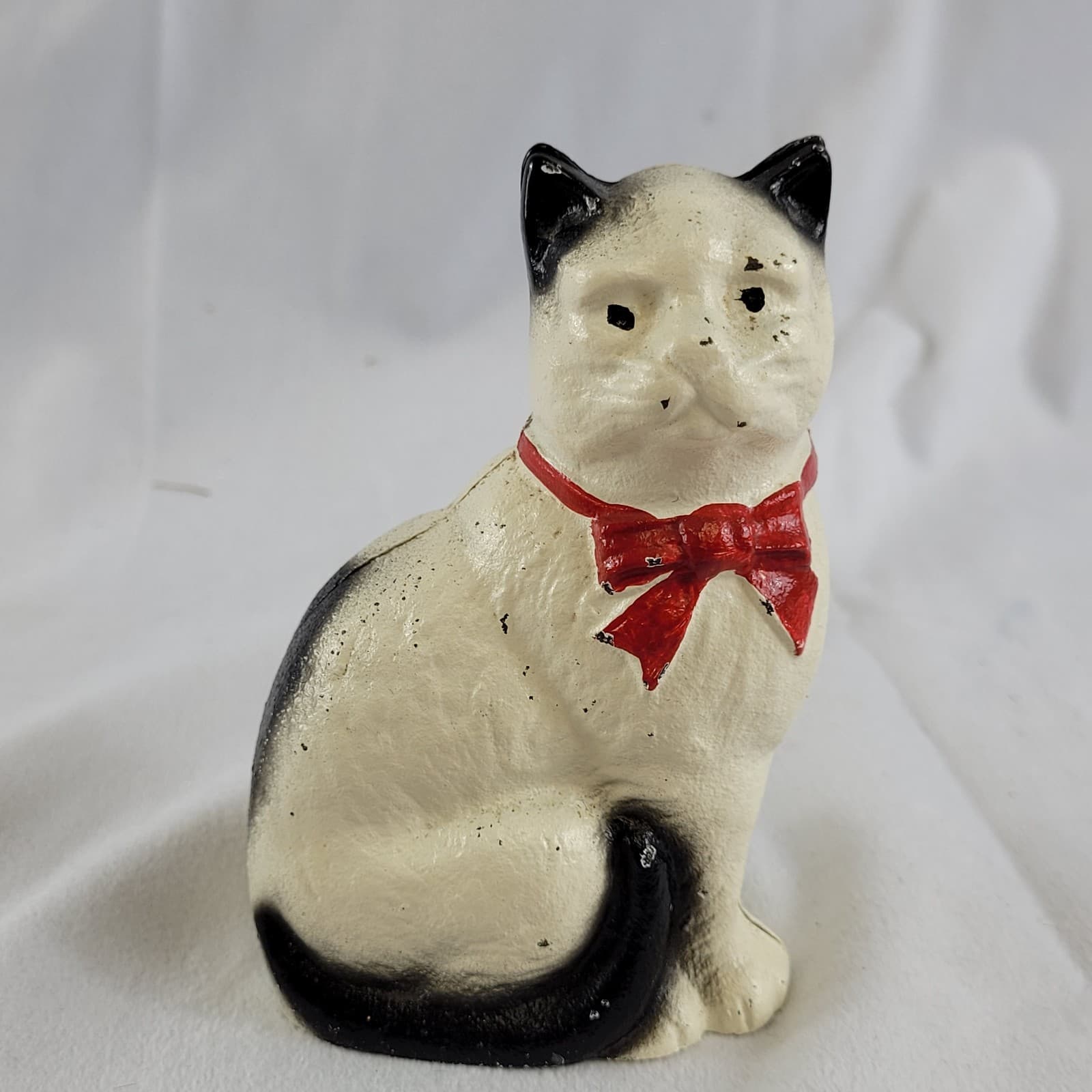 Vintage Cast Iron Cat Coin Bank with Red Bow – Black & White Kitty Figurine