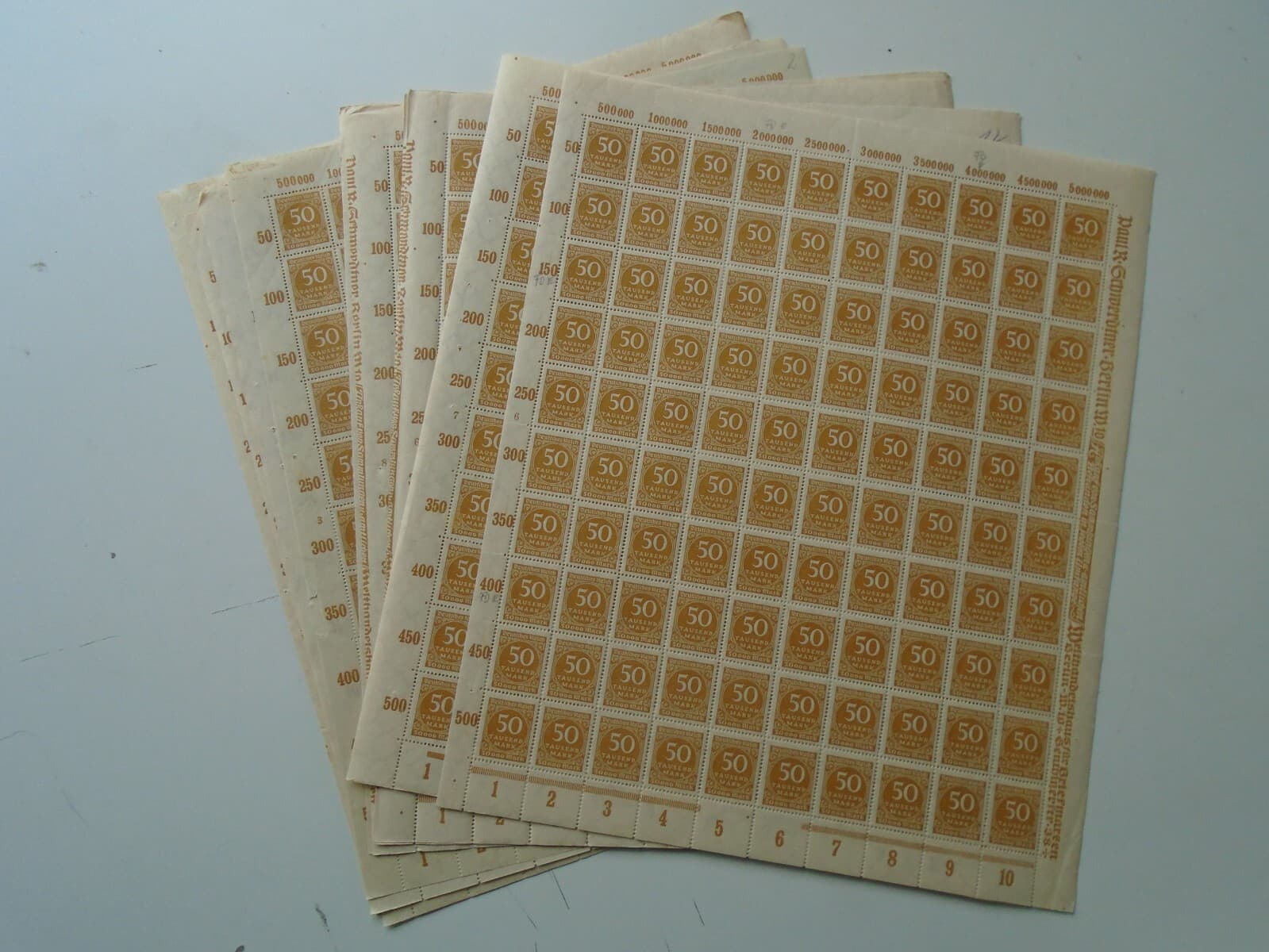 Germany - SG313 50T DM 1923 yellow bistre. 10 x complete sheets of 100 stamps.