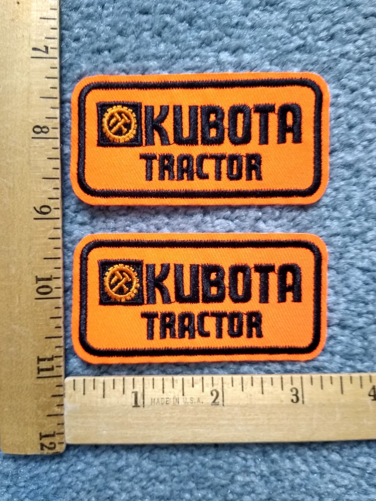 LOT OF 2 KUBOTA TRACTOR BRIGHT FLUORESCENT ORANGE IRON ON PATCHES 
