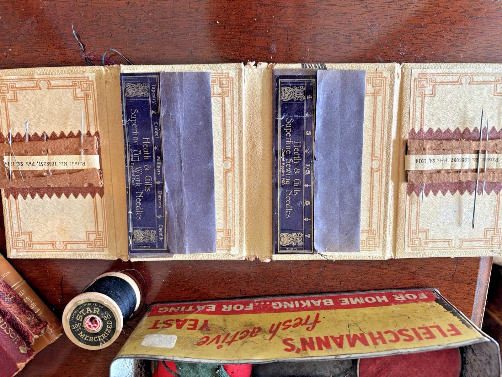 ANT TIN YEAST CONTAINER + 6 NOITIONS: ANTIQUE PIN CUSHIONS, FOLD OUT NEEDLE PACK 5