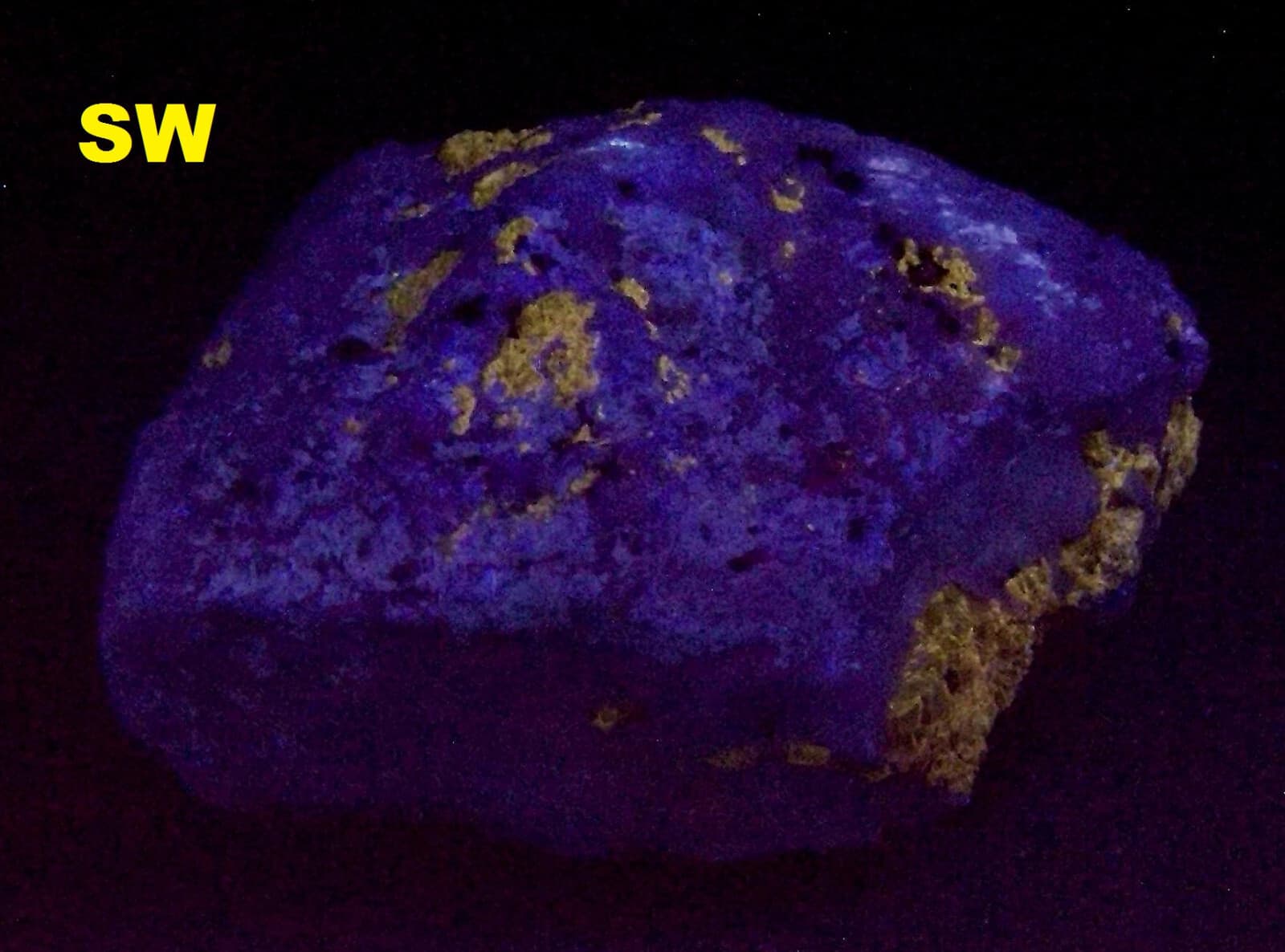 Fluorescent Dravite - Martin Marietta Texas Quarry, Baltimore Co., Maryland 3