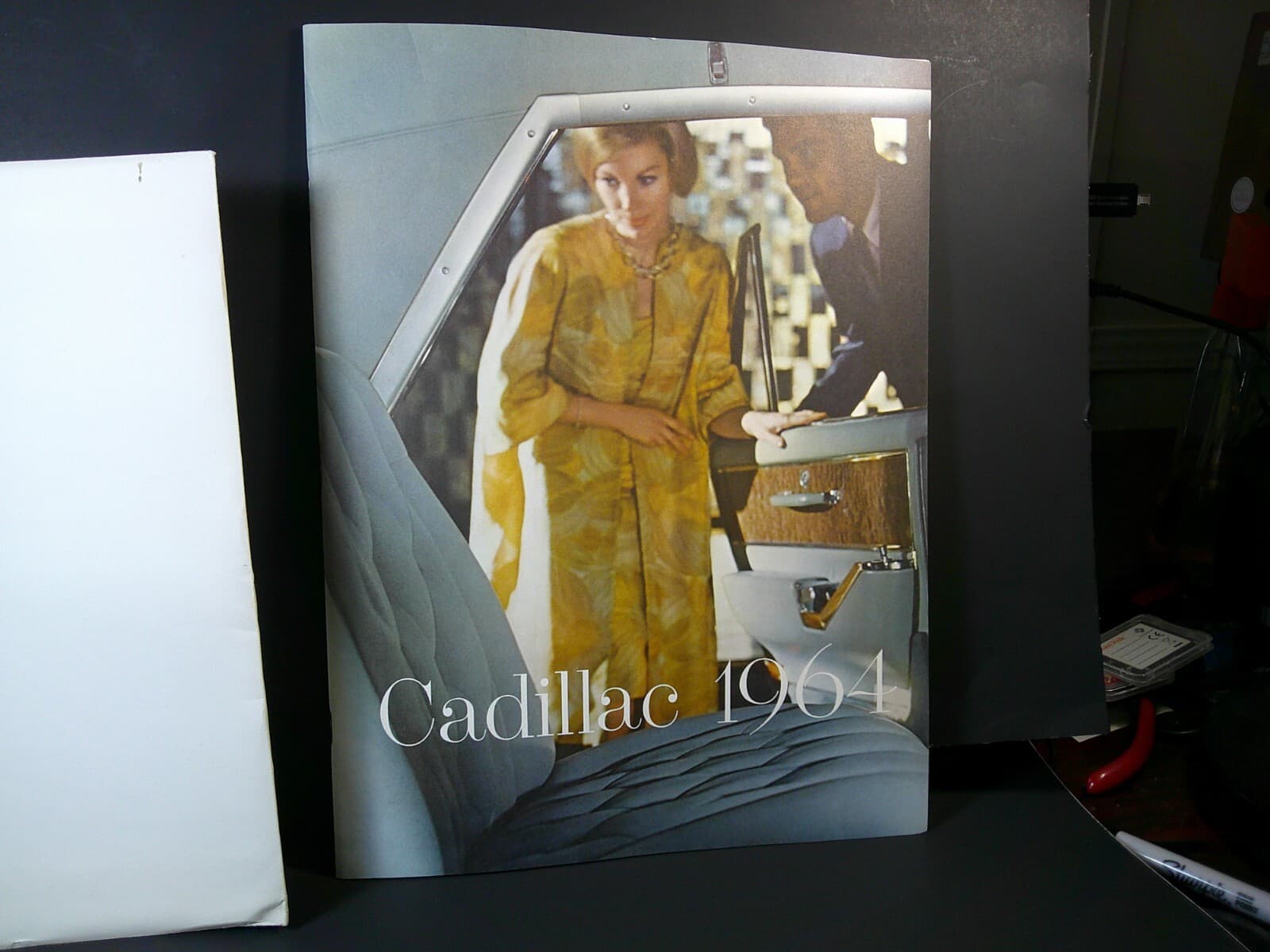 1964 CADILLAC SALES BROCHURE  9 1/2 BY 12 1/2 LARGE ORIGINAL WITH ENVELOPE NICE 2