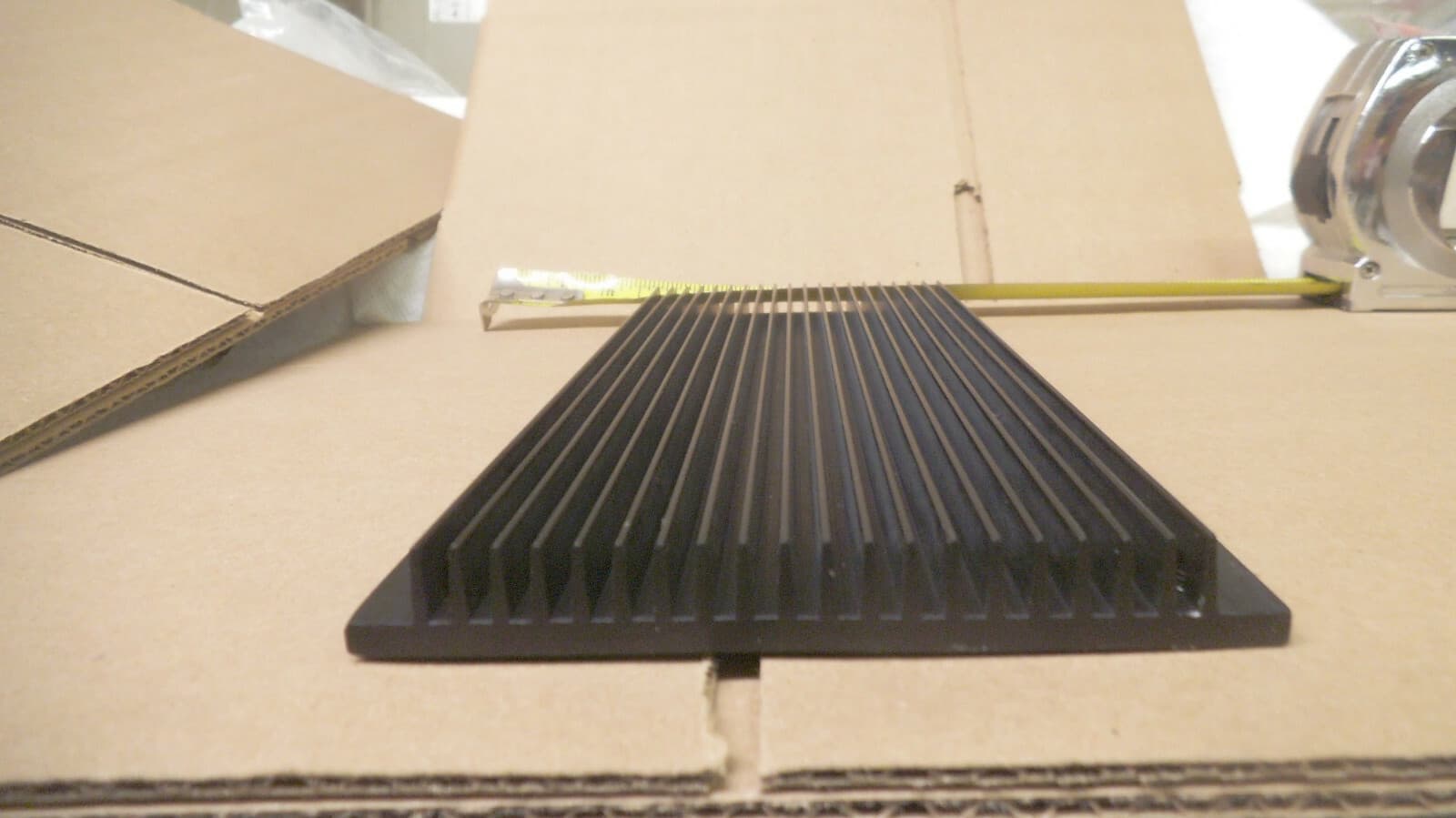 Black anodized Aluminum heat sink 8-1/2" x 4-1/4" x point 550" thick used 3