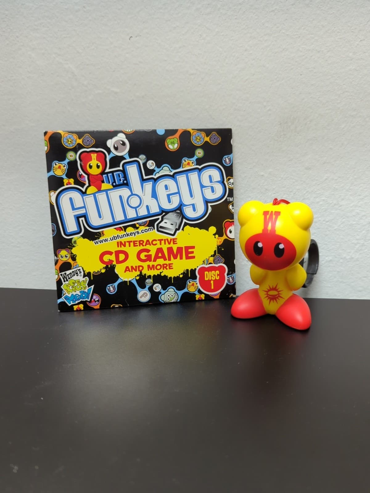 U.B. Funkeys Wendy's 2009 Mattel Figure Keychain & CD Game
