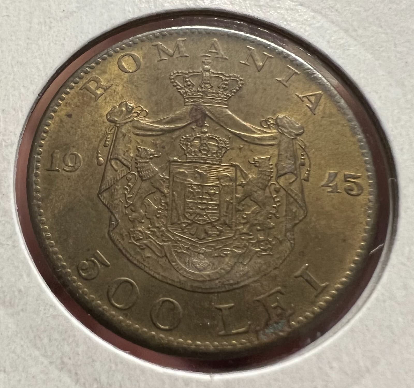 Romania  500 Lei 1945 Brass coin, a UNC