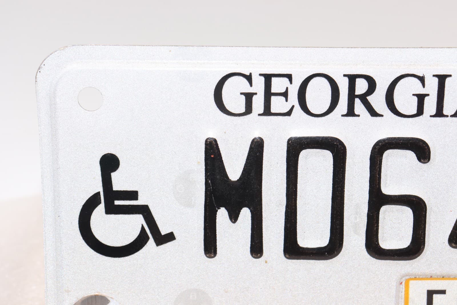 Expired, Georgia Handicap Motorcycle Plate, Registered in Feb. 2015 " MD64X " 2