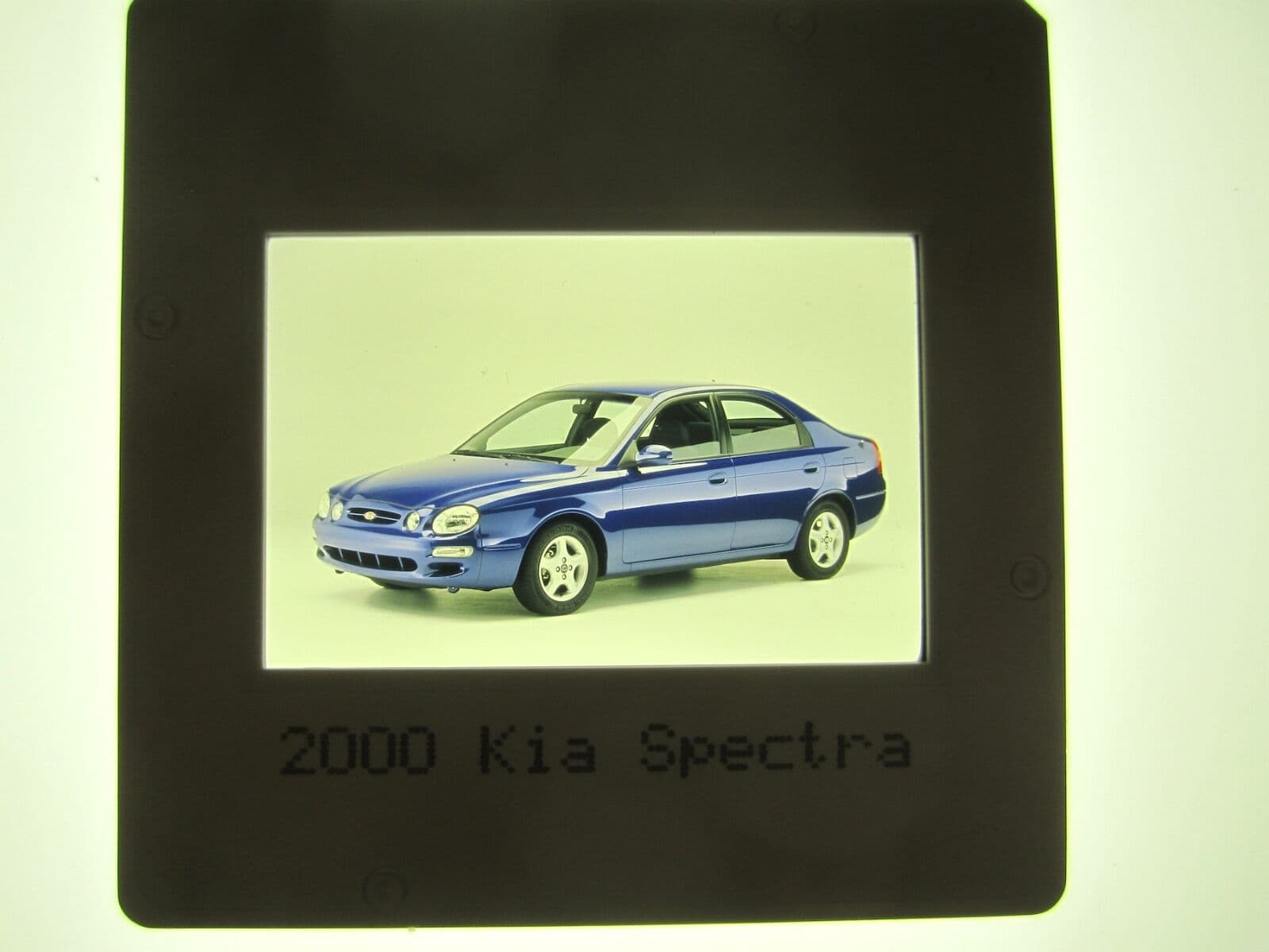 KIA SPECTRA PRESS SLIDE - 2000