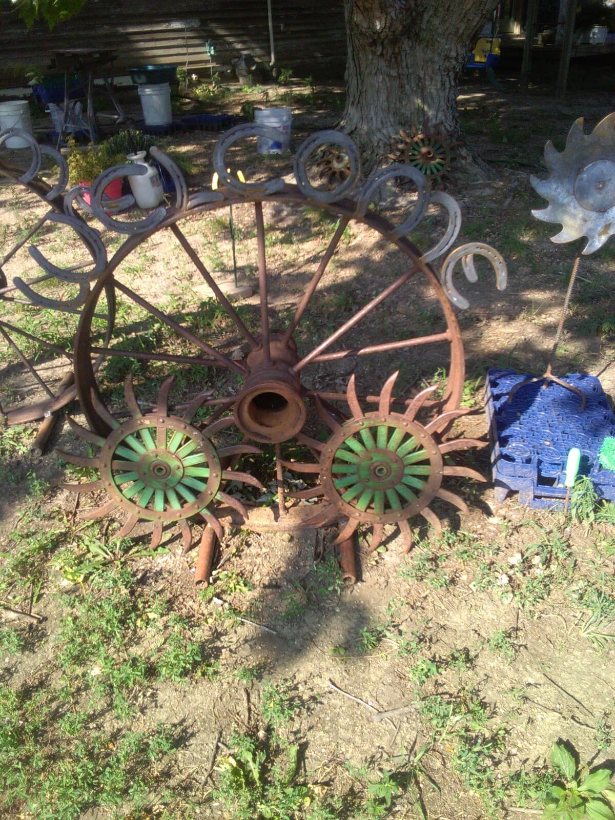 1 Wheel off of a John Deere Rotary Hoe, Yard Art Steampunk iron wheel 4