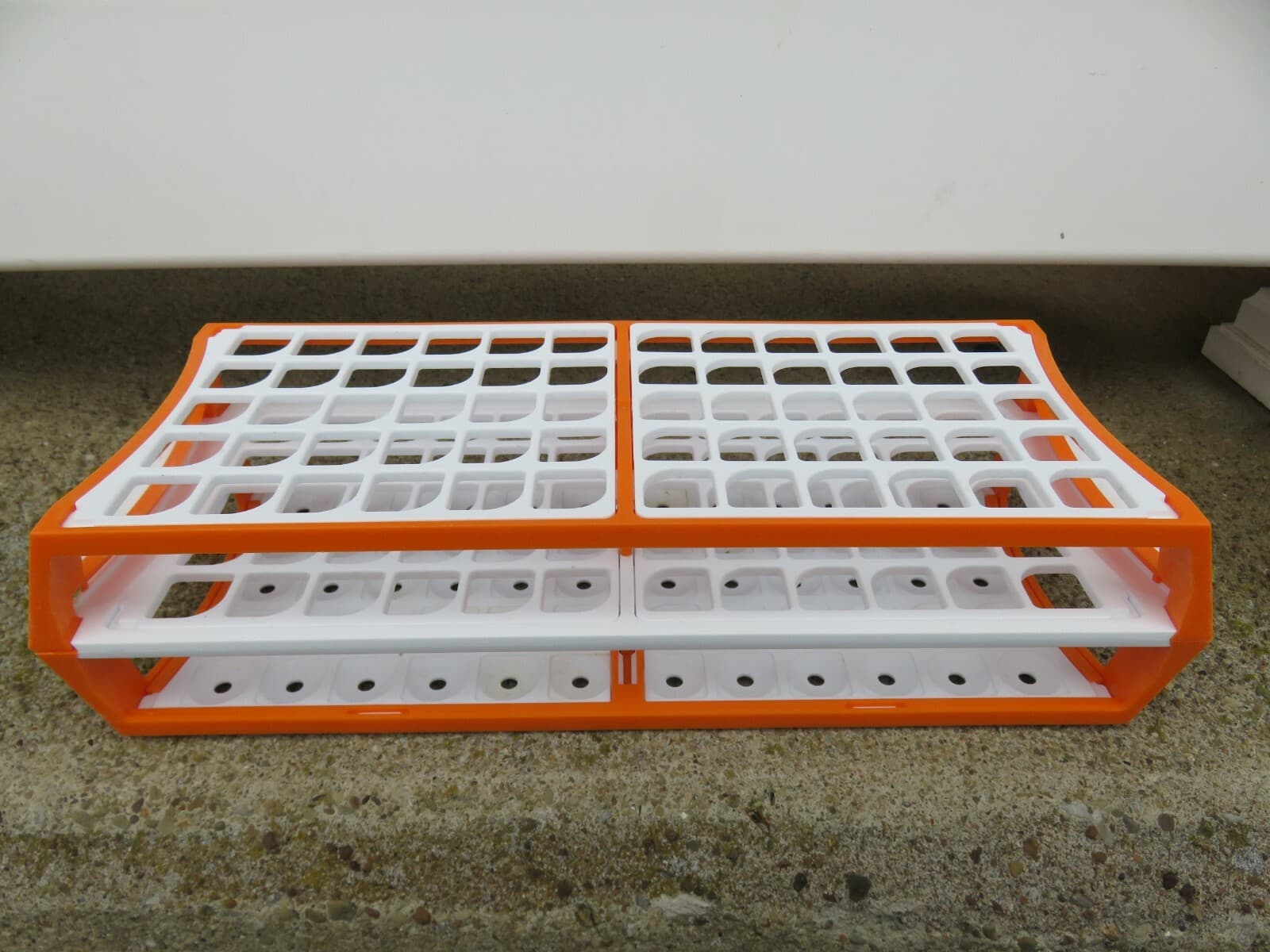 LOT of TEN (10) ORANGE & WHITE TEST TUBE RACKS (Plastic, Each Holds 60 Tubes)