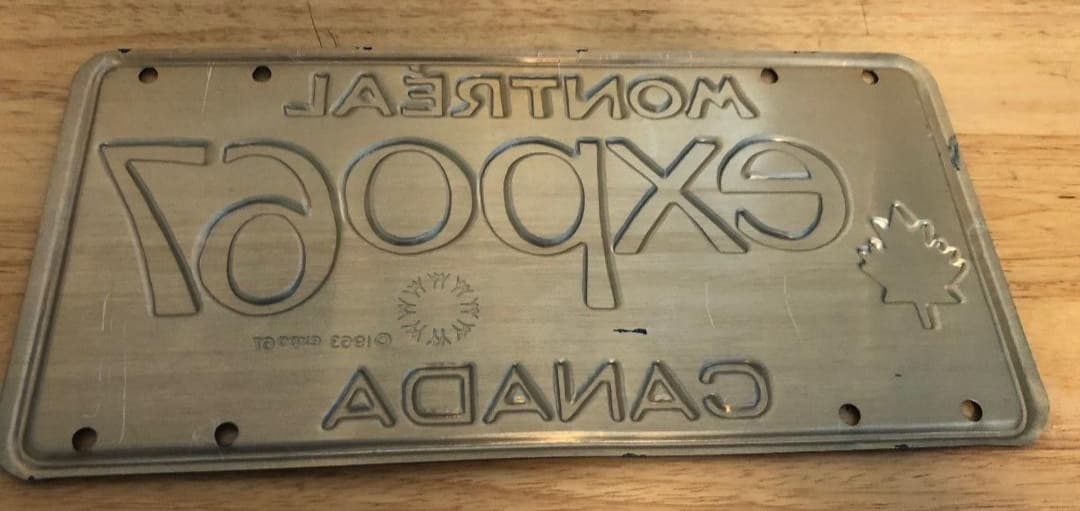 “MONTRÉAL EXPO 67” Blue Metal License Plate World’s Fair Canada 1967 Unused READ 4