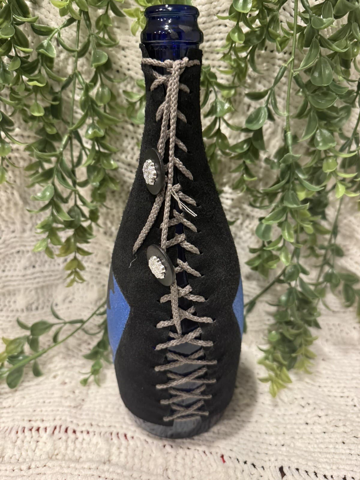 Handcrafted One-of-a-Kind Black Leather Wrapped Bottle  Another Realm Las Vegas 3