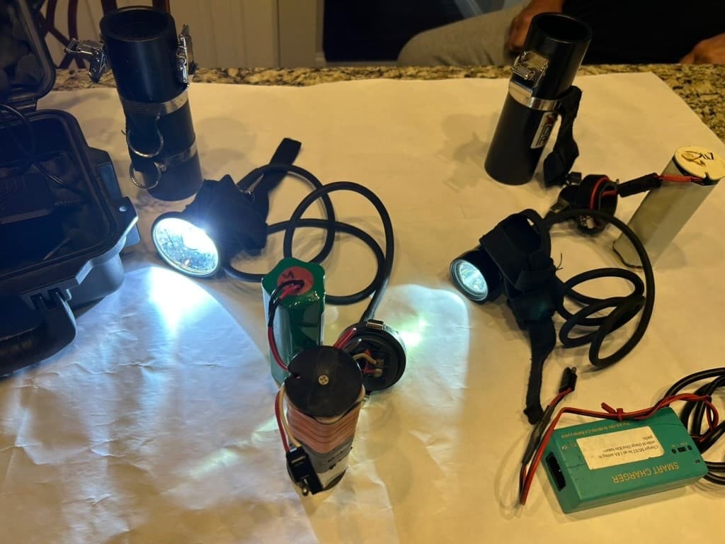 2 Dive Rite canister lights, 1 LX25 and 1 H-10, 3 batteries.   Used, selling as 