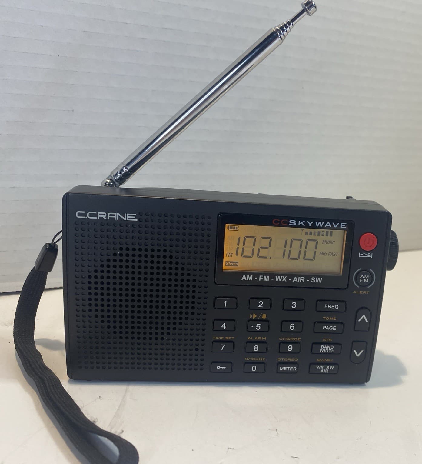 C. CRANE CC SKYWAVE RADIO 2 AM, FM, SHORTWAVE, NOAA WEATHER + ALERT, VHF