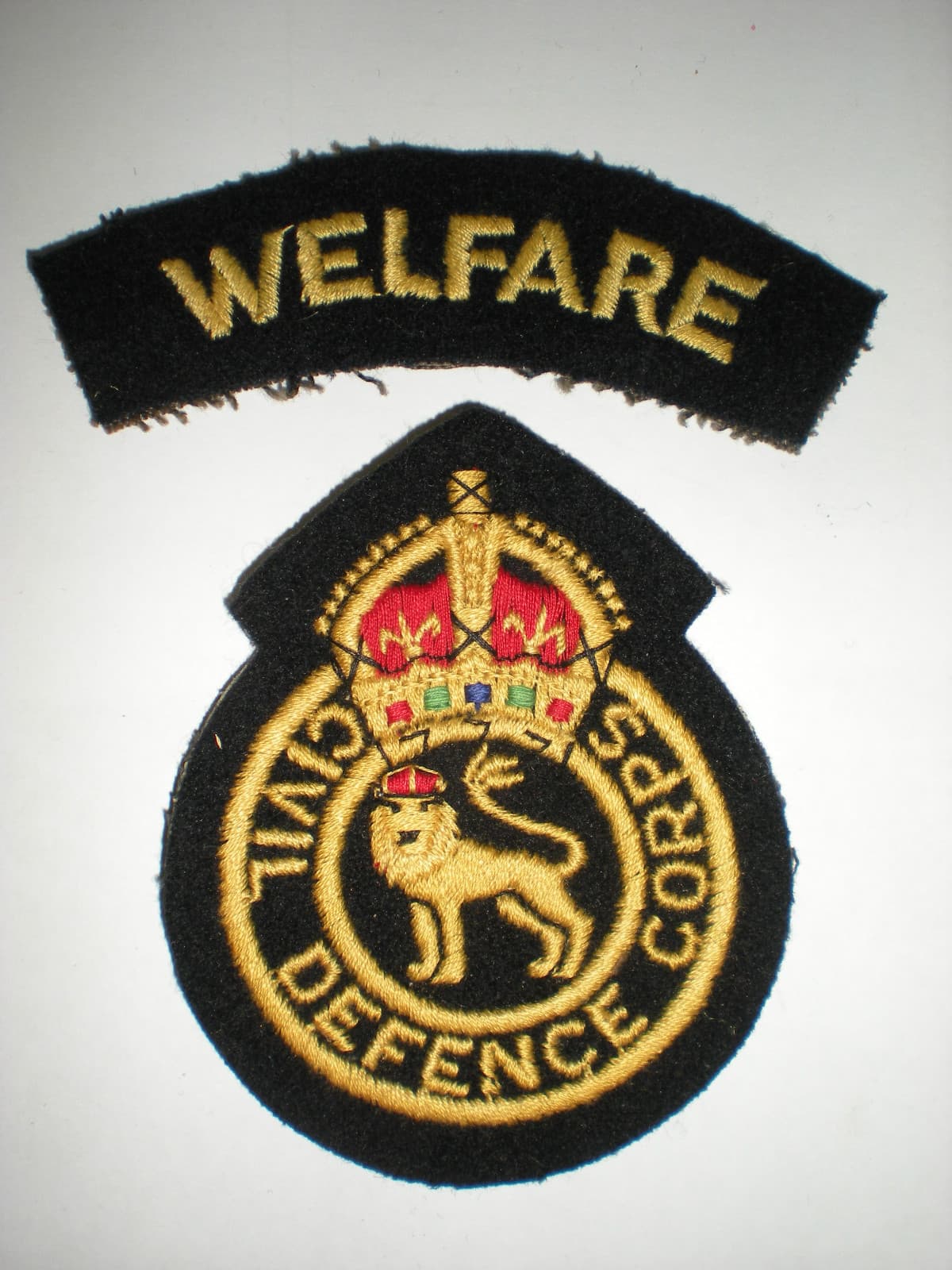 BRITISH CIVIL DEFENSE CORPS PATCH WITH WELFARE TAB - PRE-1952