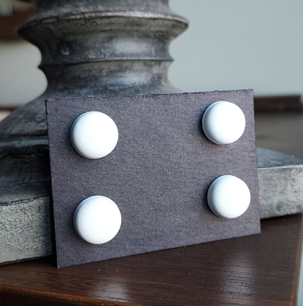 White magnetic pins.  Bib magnets, horse show number magnetic pins, clothing pin 2