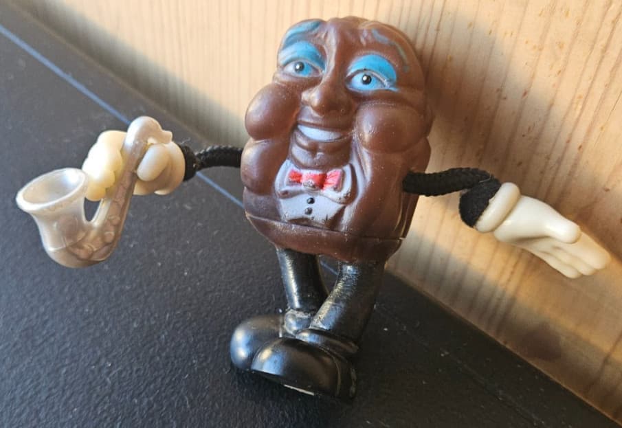 CALIFORNIA RAISINS, SAXOPHONE BENDY VINYL FIGURE. 1989 CALRAB, APPLAUSE.