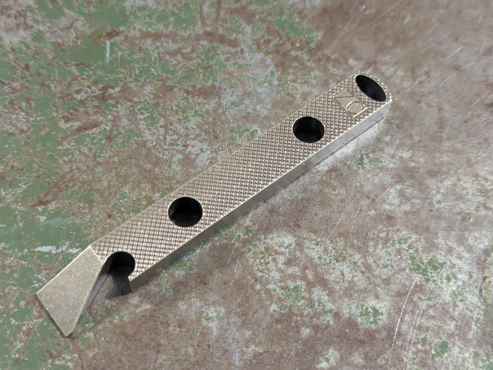 Brass Knurled Pattern Pry Bar with Patina 4