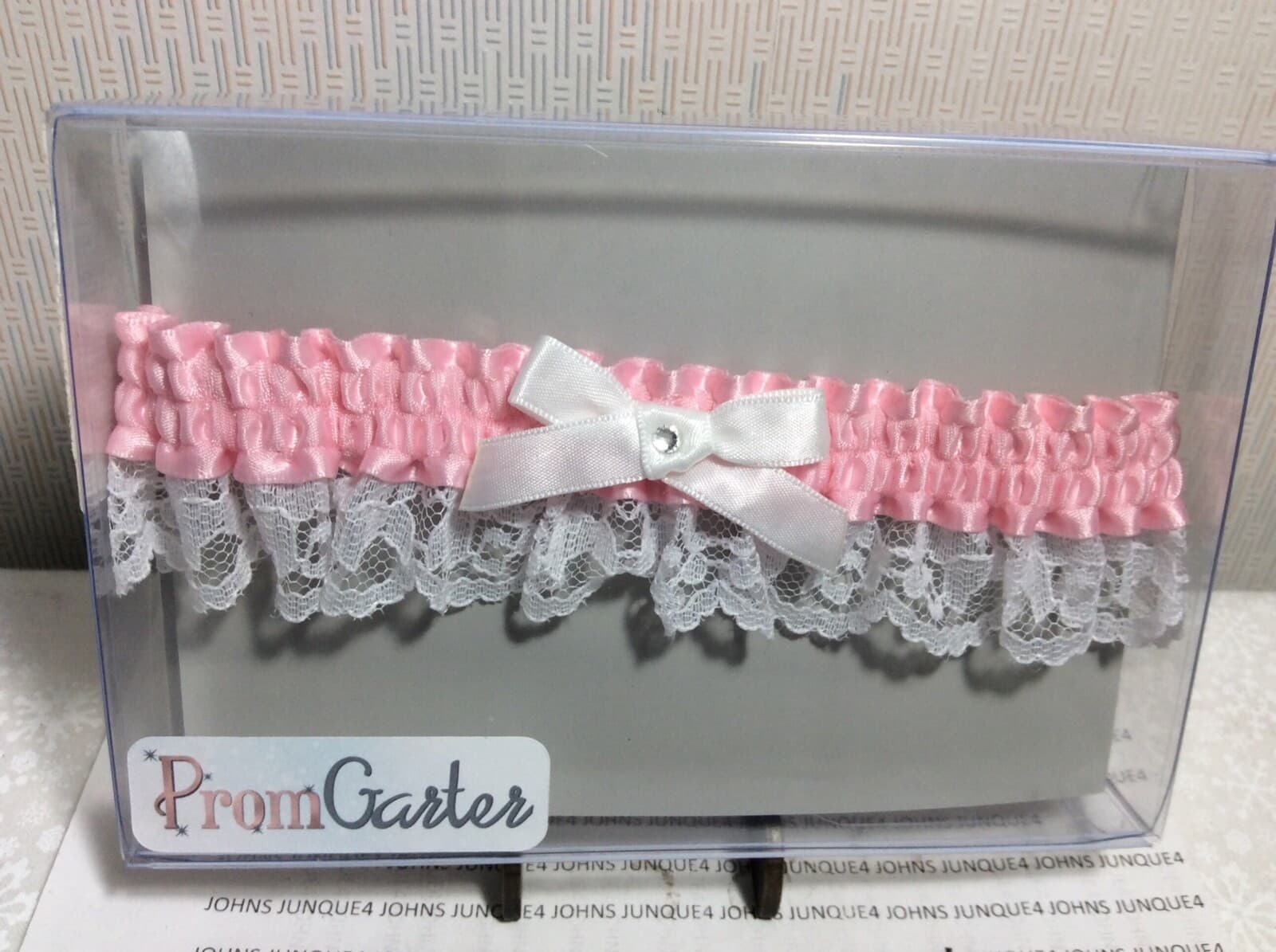 WEDDING OR PROM GARTERS New in plastic casing PINK GARTER with White Bow w/stone