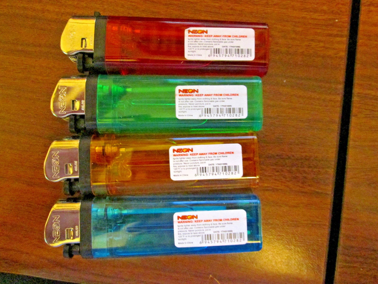 4 NEW NEON BRAND FREE SHIP DISPOSABLE CIGARETTE LIGHTERS REG CLASSIC STYLE 2