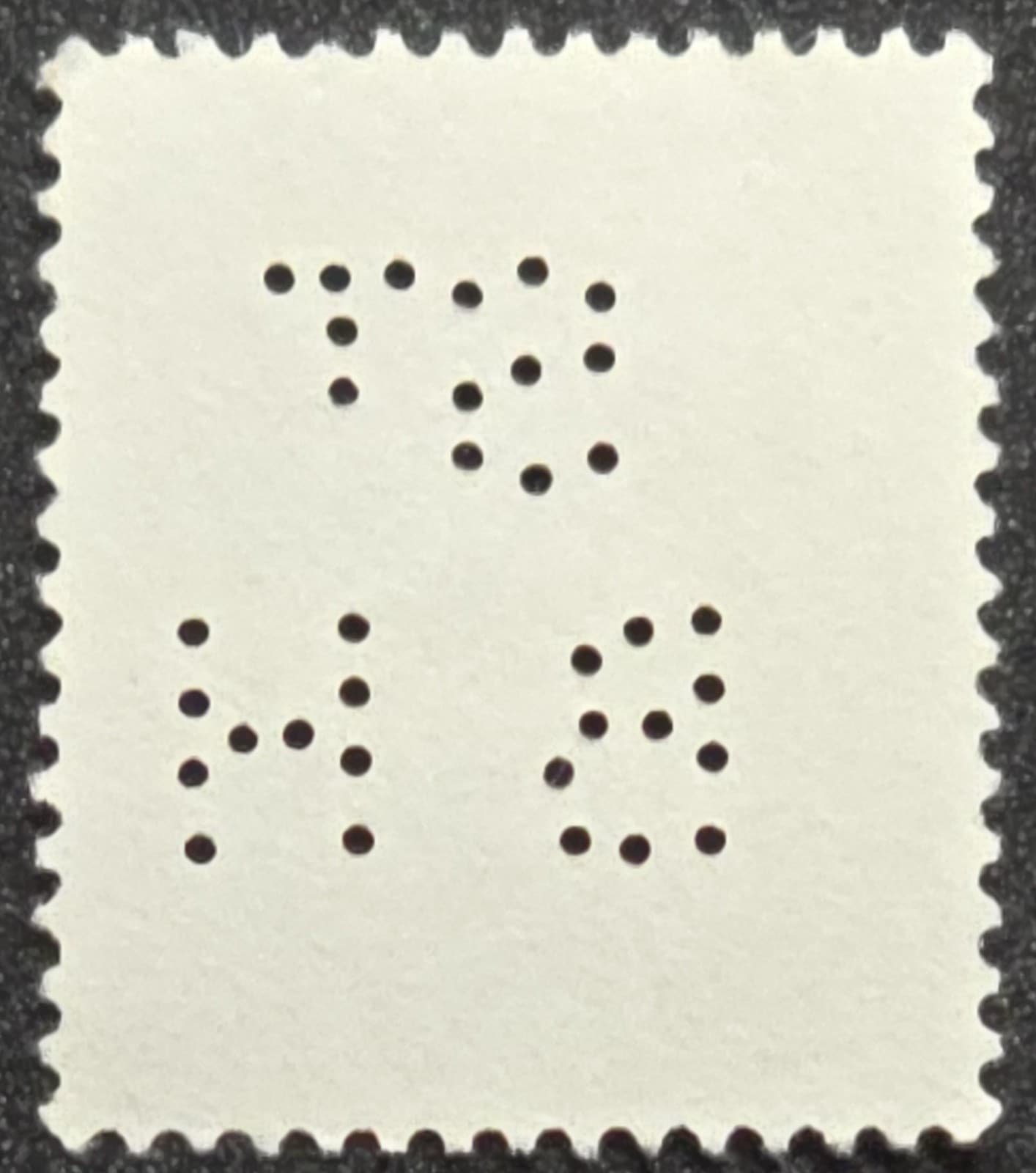 UK - 1970s Queen Elizabeth II 14p Machin Head  - "St BH" PERFIN – Stamp 2