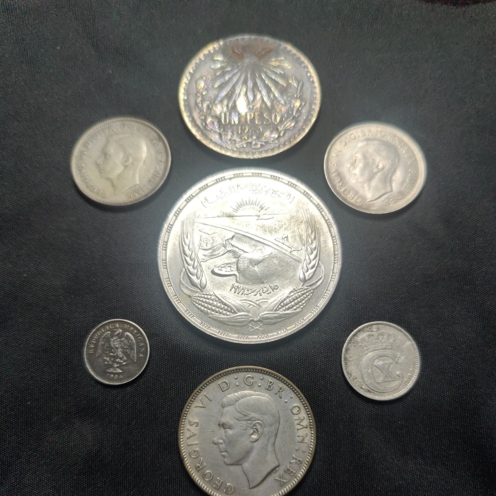 Lot of 7 world silver coins. Nice Variety 
