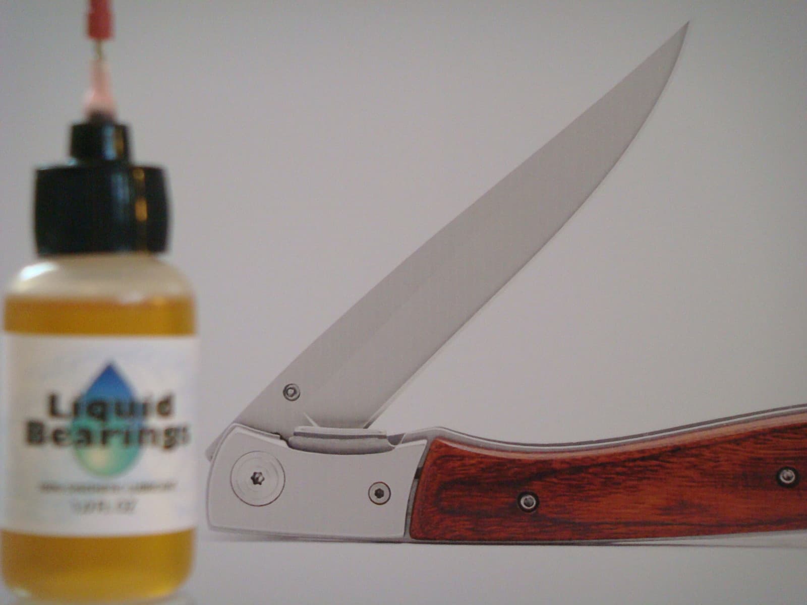 Liquid Bearings, 100%-synthetic LUBRICANT for vintage knives, includes 2 needles 4