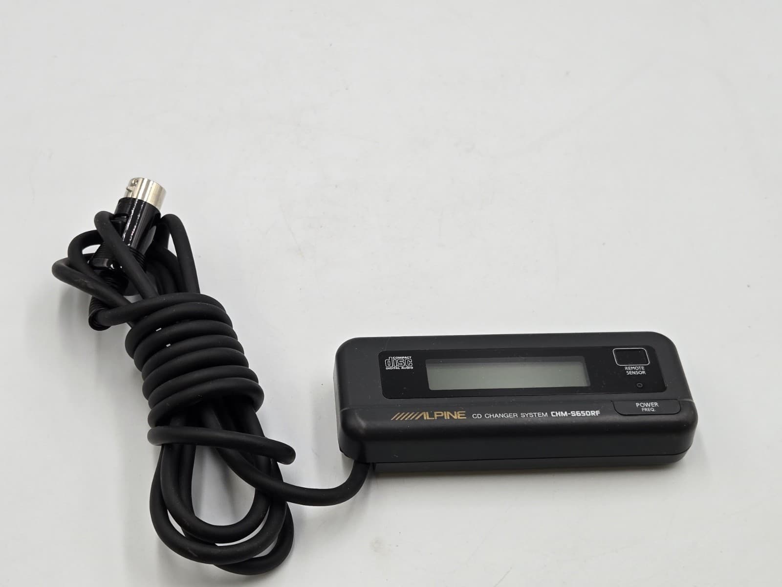 Alpine CHM-S650 CD Changer Controller & Cord. Normal Scuffing.