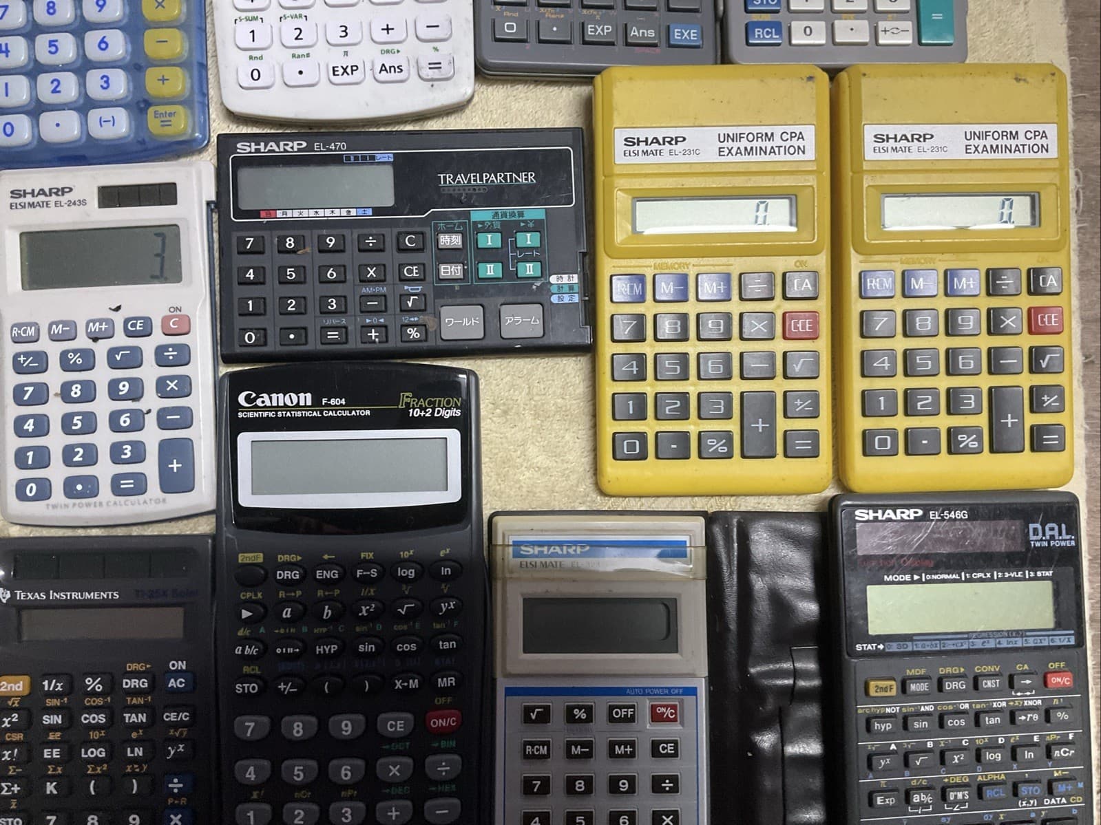 Vintage Calculator Lot of 30 – Casio TI Sharp – W/15 Covers Amost All Working 3