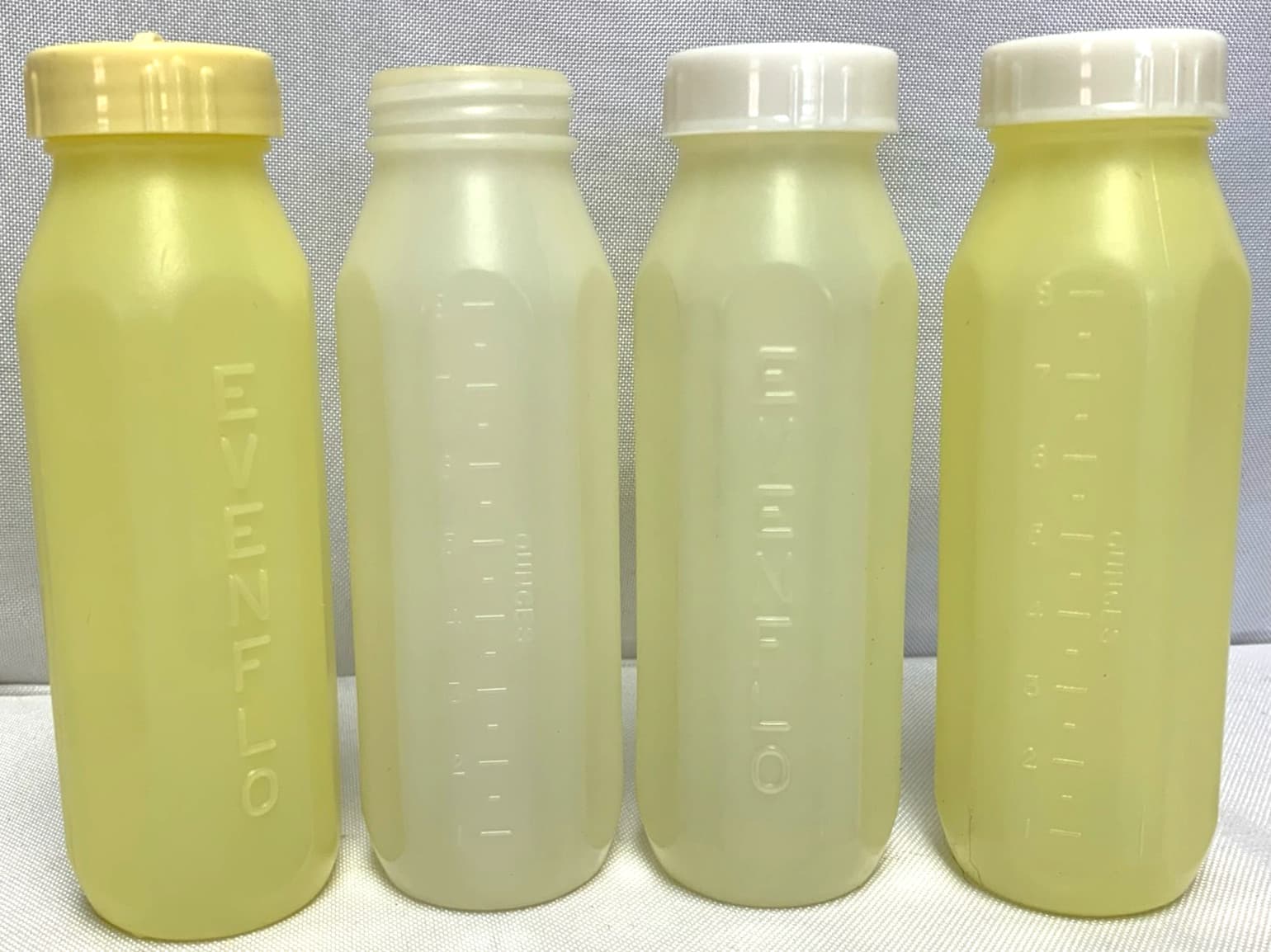 Vintage EVENFLO Baby Bottles Lot of 9 Infant Formula Feeding Plastic Pastel 3