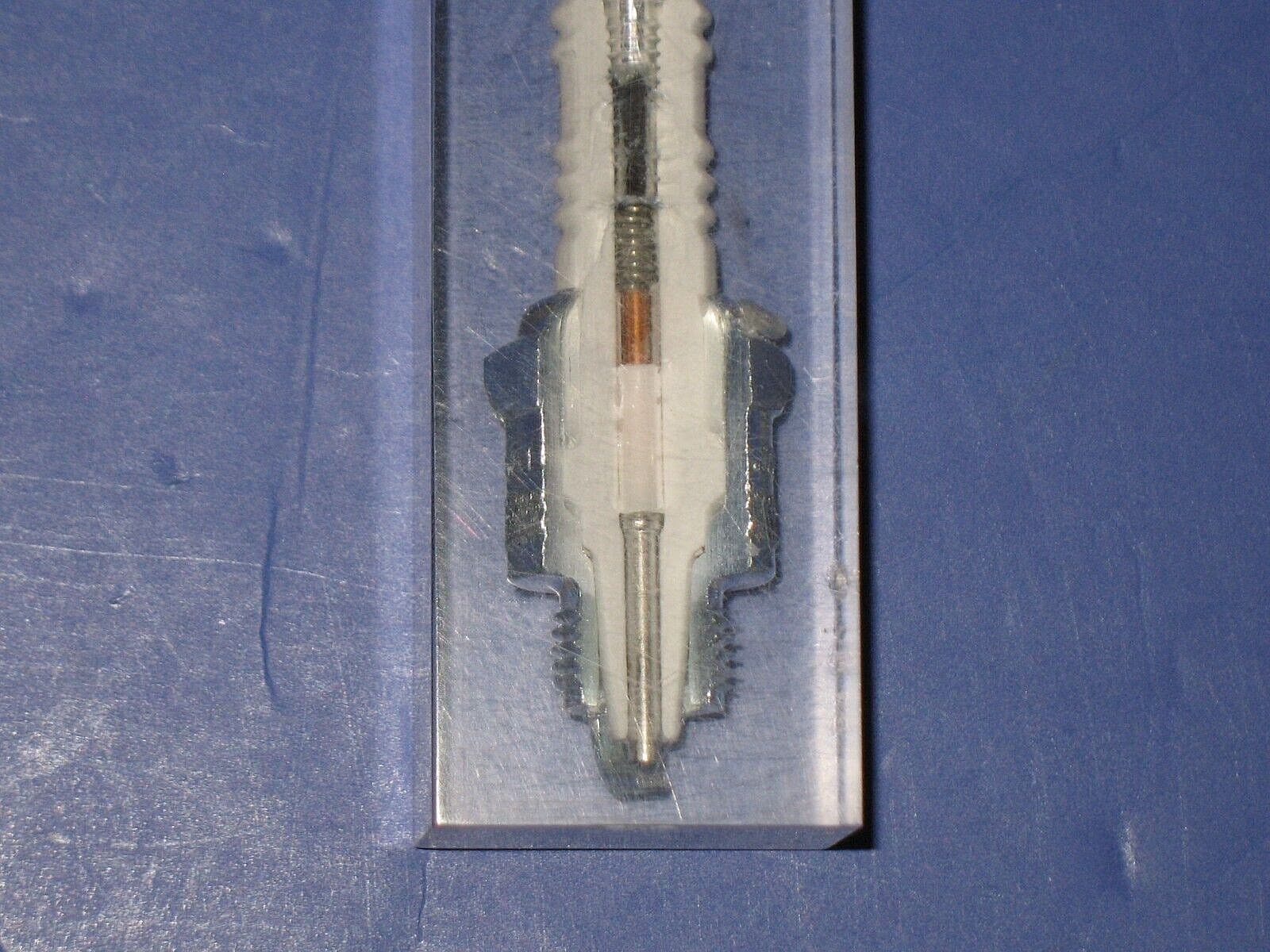 CHAMPION - SPARK PLUG CUT AWAY  SPARK PLUG IN LUCITE PAPERWEIGHT ADVERTISING 6