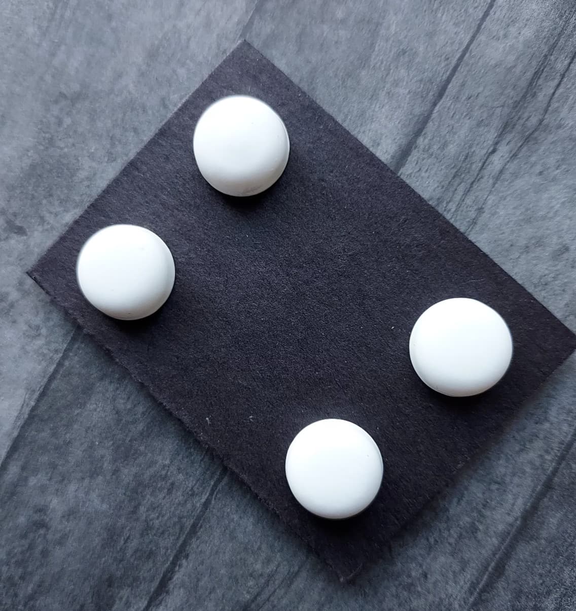 White magnetic pins.  Bib magnets, horse show number magnetic pins, clothing pin