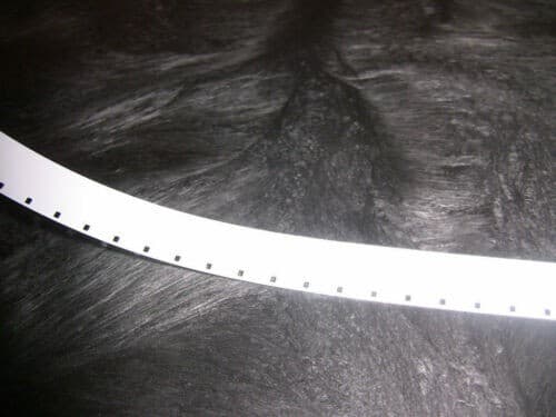 16MM SINGLE PERF. WHITE FILM LEADER  NEW MYLAR (estar) 1000FT ROLL 2