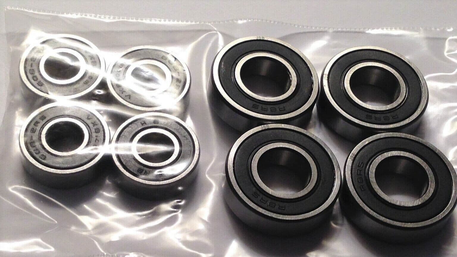 4 WHEELCHAIR CASTER BEARINGS 5/16 + 4 - 1/2" REAR BEARINGS=QUICKIE, ETC