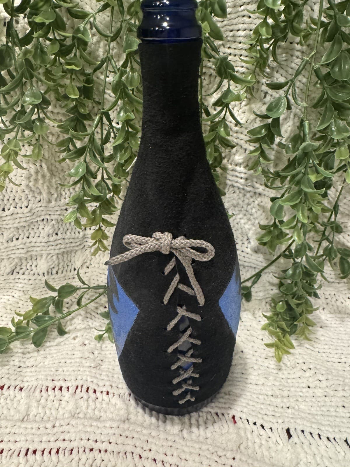 Handcrafted One-of-a-Kind Black Leather Wrapped Bottle  Another Realm Las Vegas 6