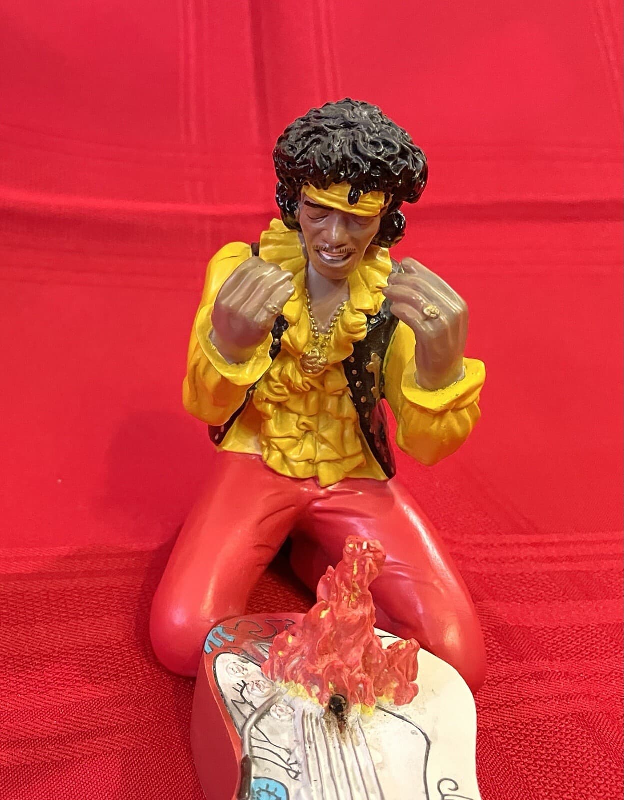 Jimi Hendrix Figure Sitting Burning Guitar in 1967 at the Monterey Pop Festival 2