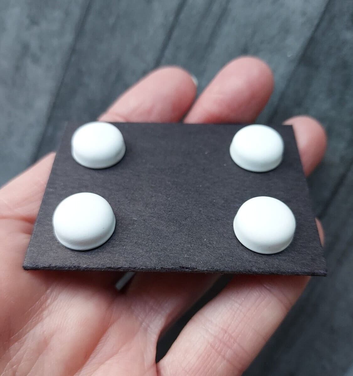 White magnetic pins.  Bib magnets, horse show number magnetic pins, clothing pin 5