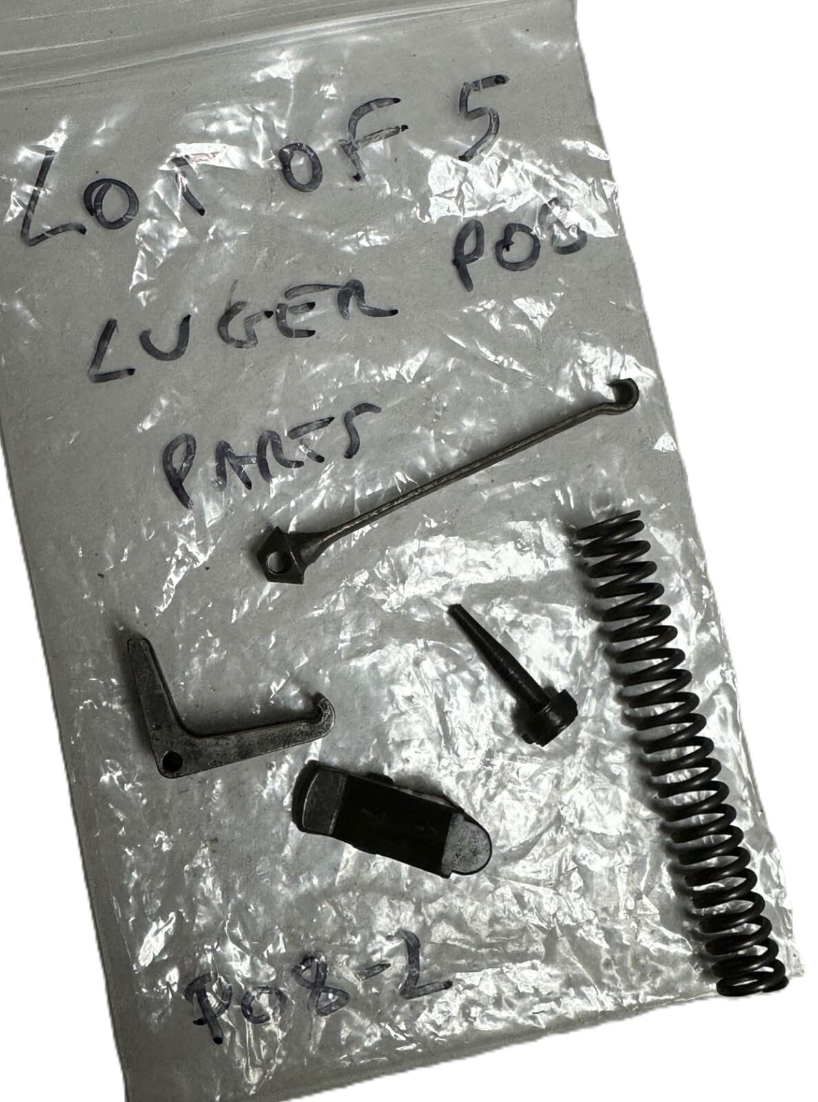 LOF OF 5 LUGER WWII P08  SPARE PARTS. ITEM # P08-2