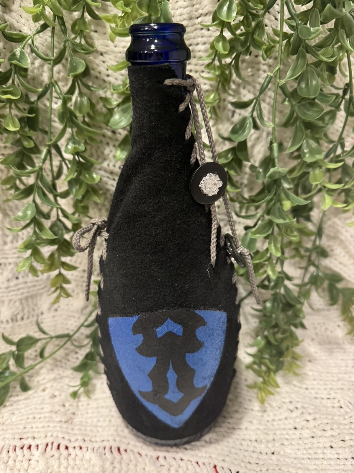 Handcrafted One-of-a-Kind Black Leather Wrapped Bottle  Another Realm Las Vegas