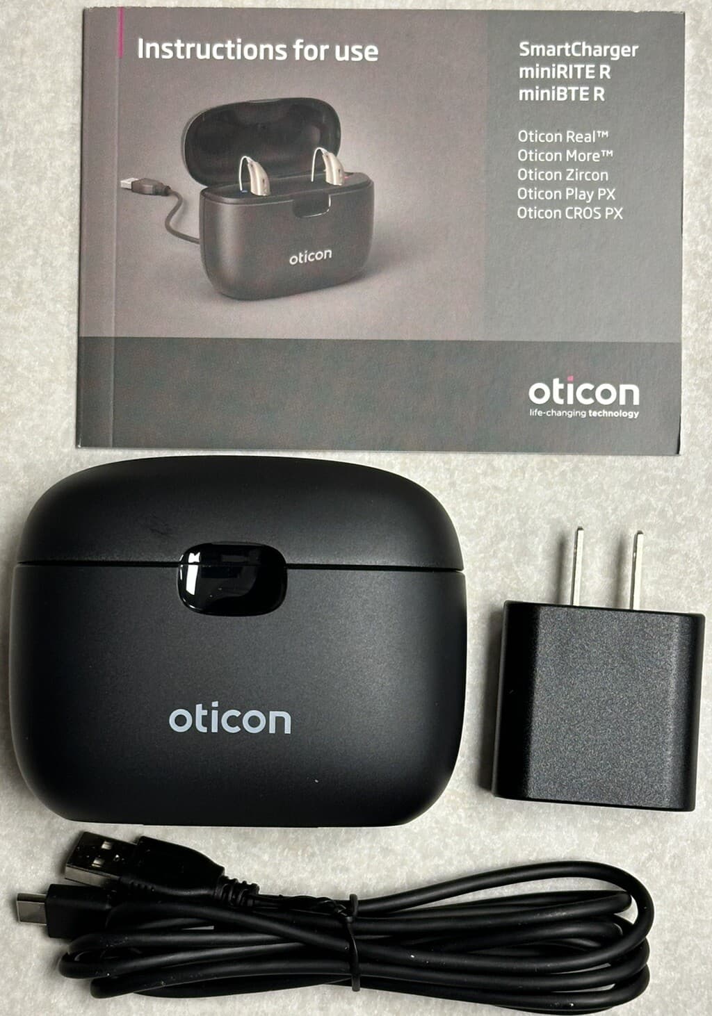 Oticon Smart Charger Comes With Power Cable, Wall Adapter, Manual. Lightly Used. 4