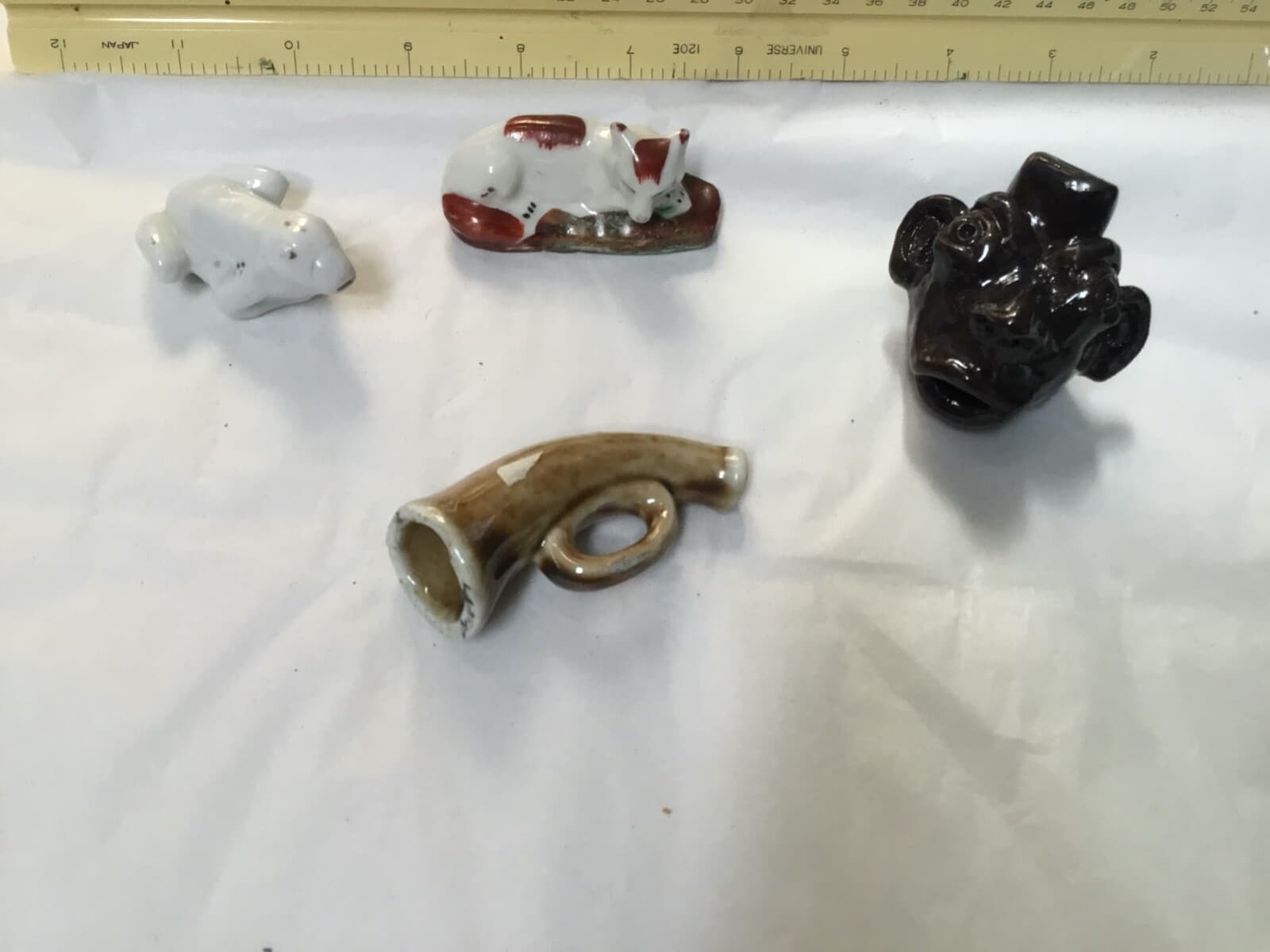 antique figural whistles