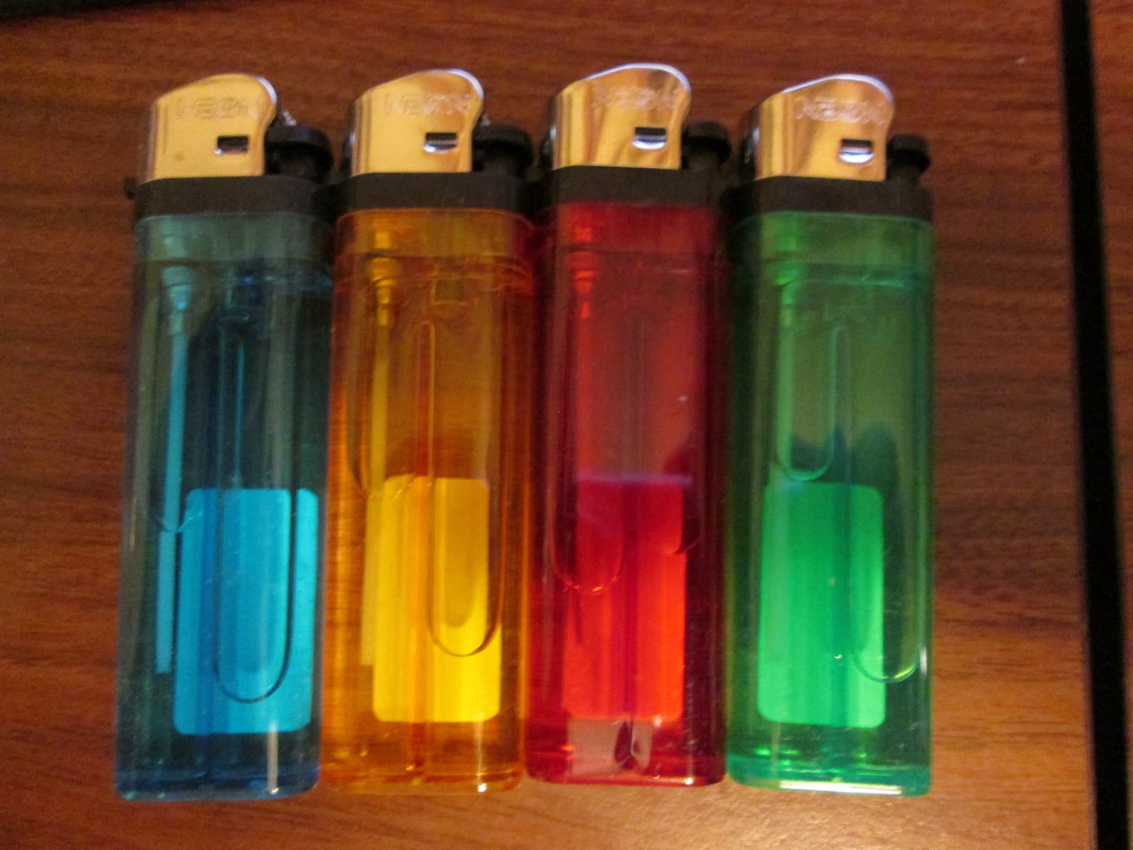 4 NEW NEON BRAND FREE SHIP DISPOSABLE CIGARETTE LIGHTERS REG CLASSIC STYLE 4