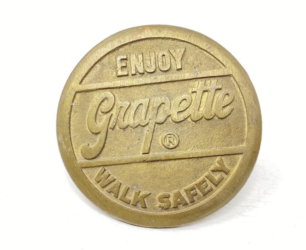 Vintage Enjoy Grapette Soda Walk Safely Heavy Brass Sidewalk Marker Nice Cond.!