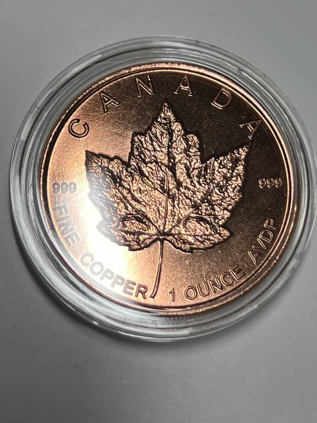 1 oz Copper Round - Canada Maple Leaf Design in Protective Capsule