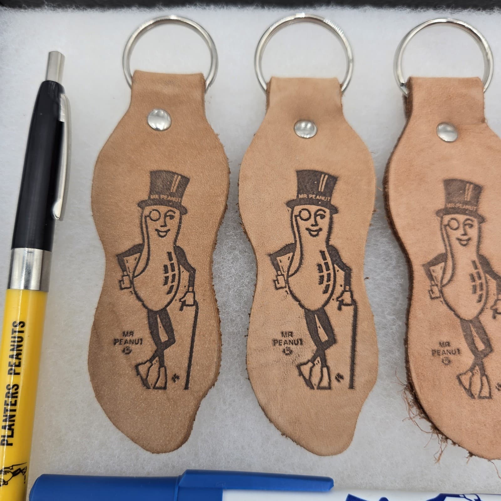 Planters Mr. Peanut Lot of 4 Leather Key Chains & 4 Ball Point Pens in Case 4