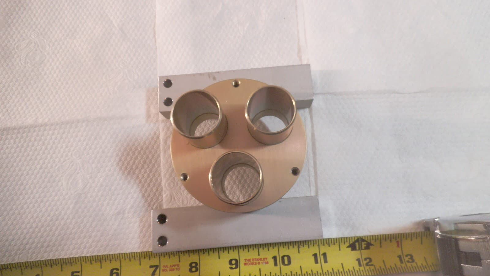 Chromate plated Aluminum disc with 3 ports, 2-15/16" OD x 2" tall 4